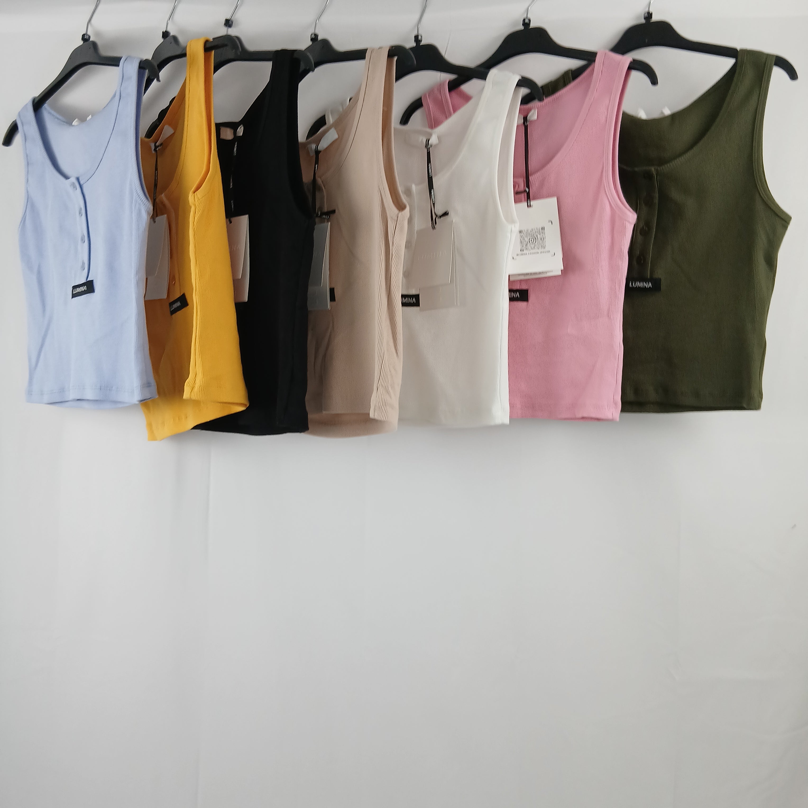 Lumina top con bottoni