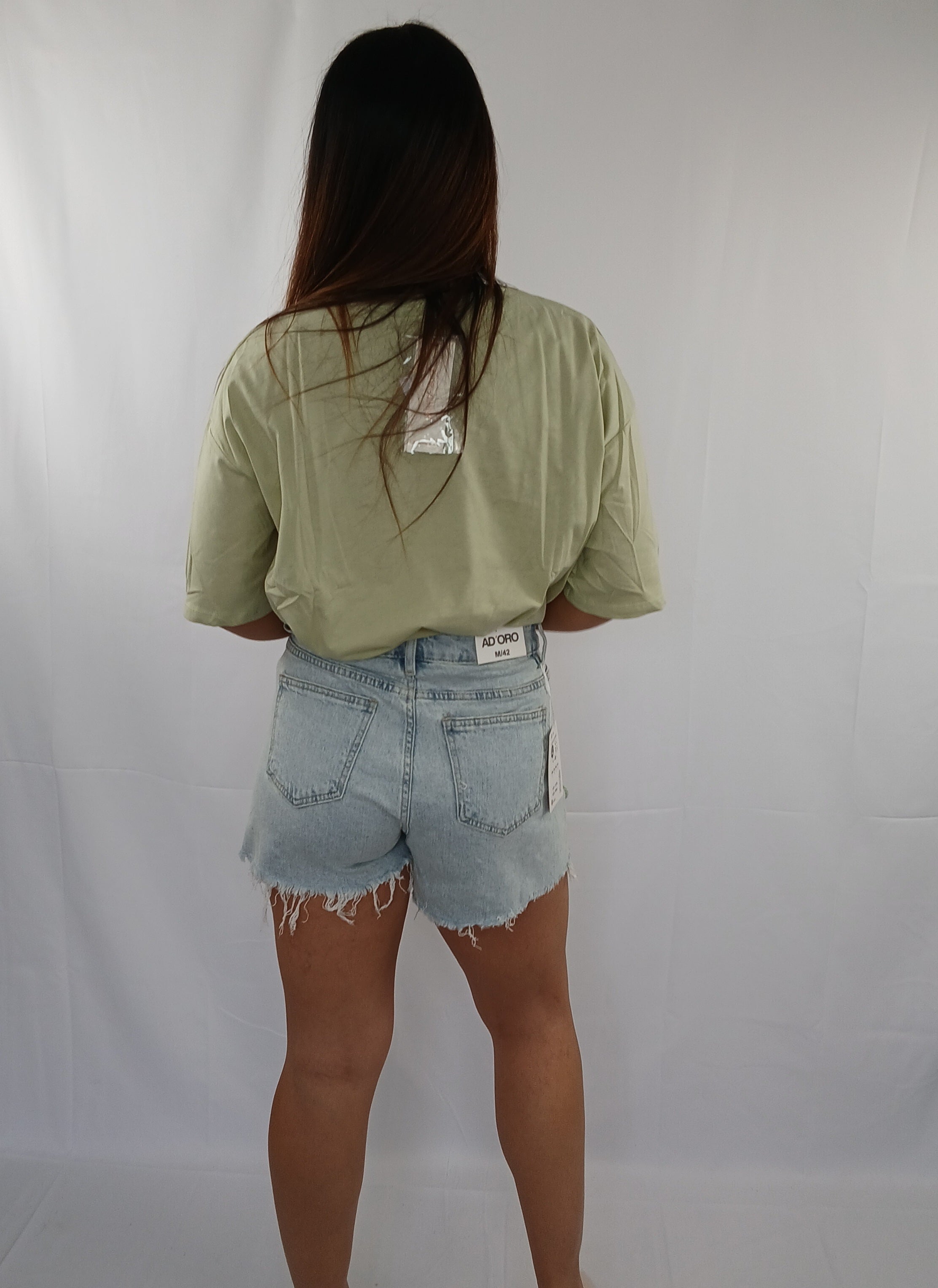Jeans con fiori cuciti