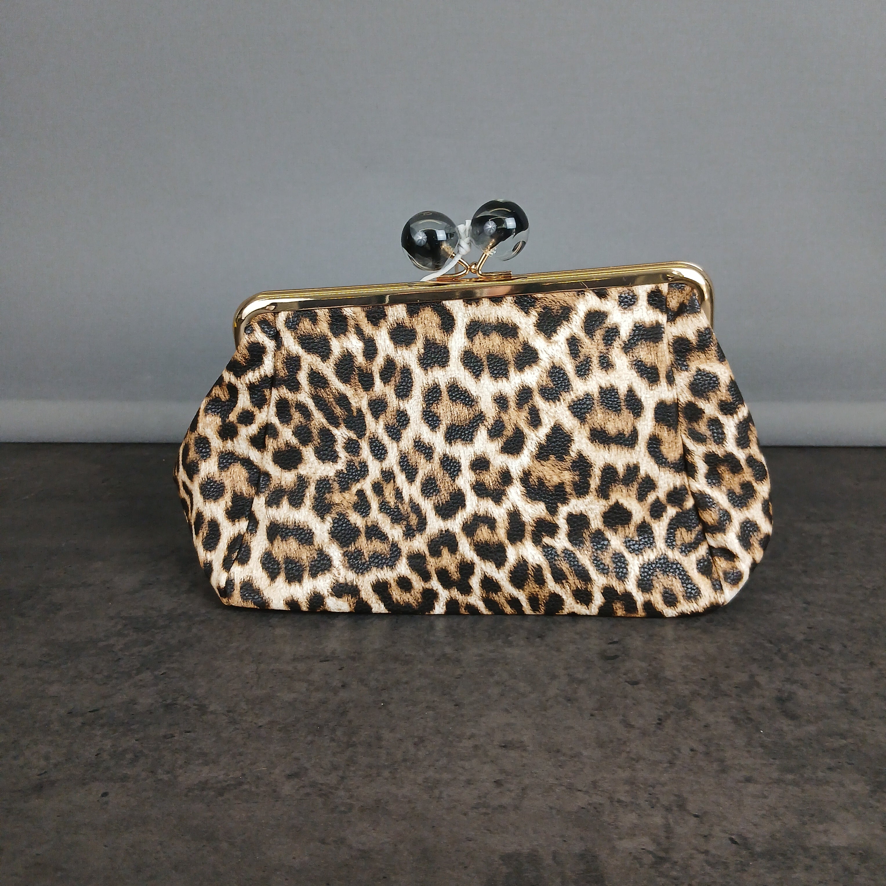 Pochette animalier con chiusura a bacio
