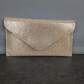 Pochette glitterata e tracolla removibile