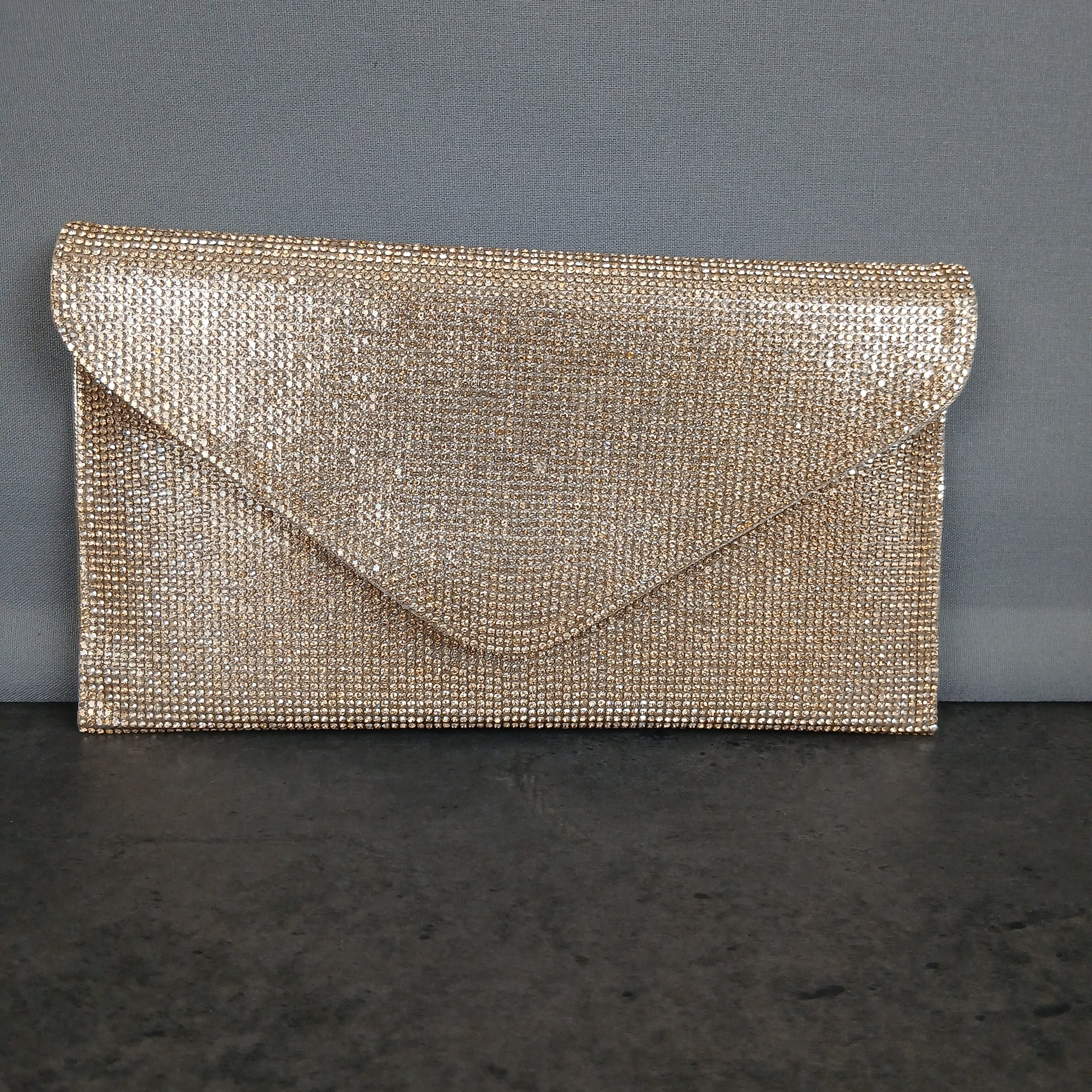 Pochette glitterata e tracolla removibile