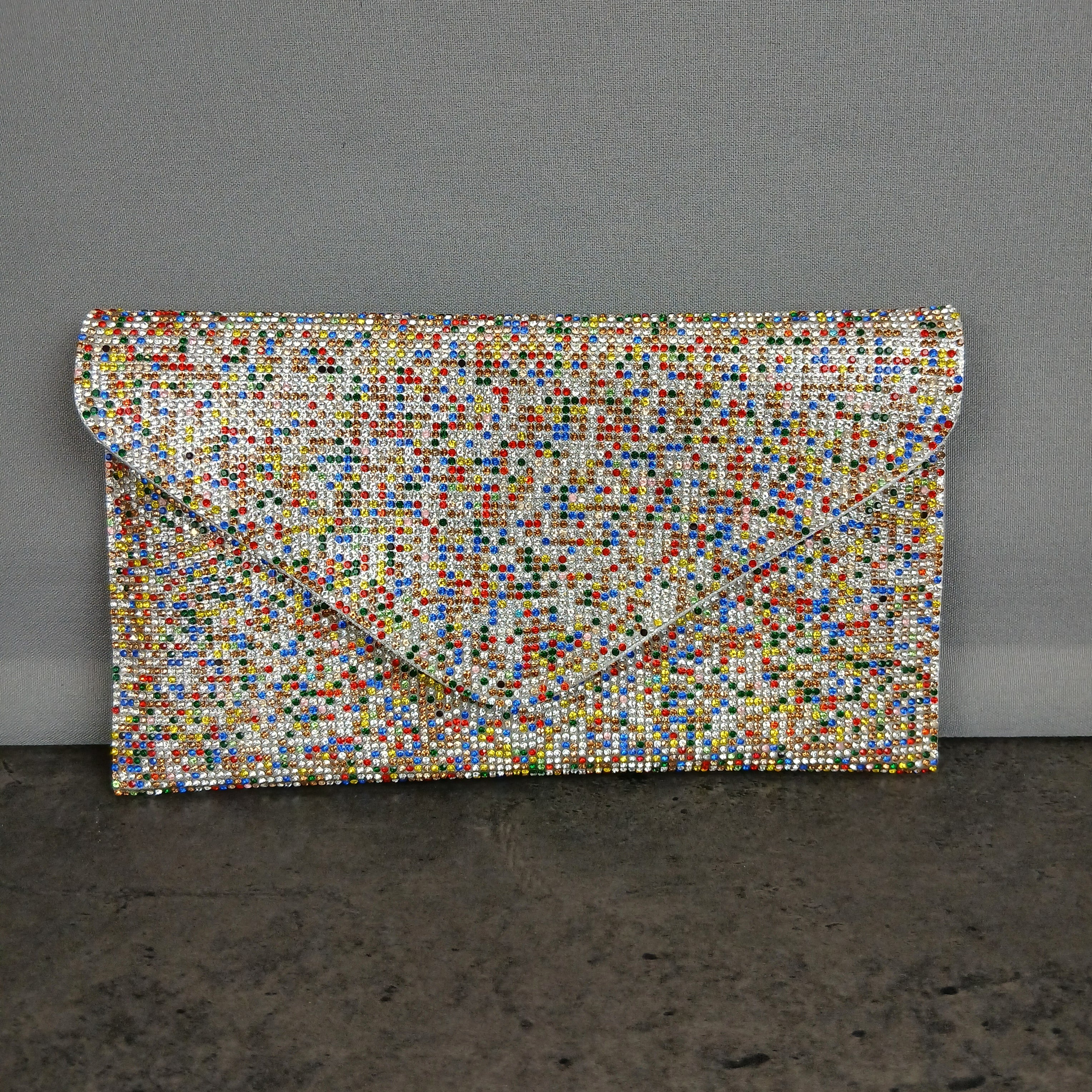 Pochette glitterata e tracolla removibile
