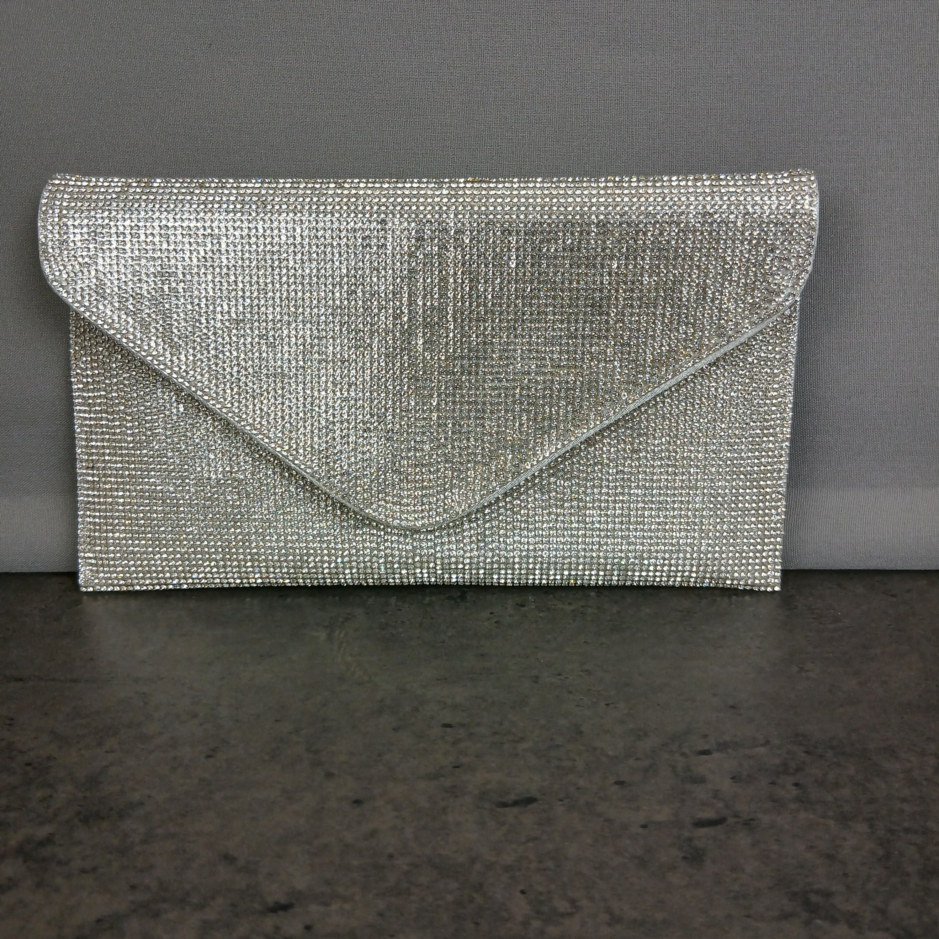 Pochette glitterata e tracolla removibile