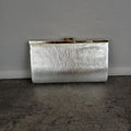 Pochette vintage con chiusura a scatto