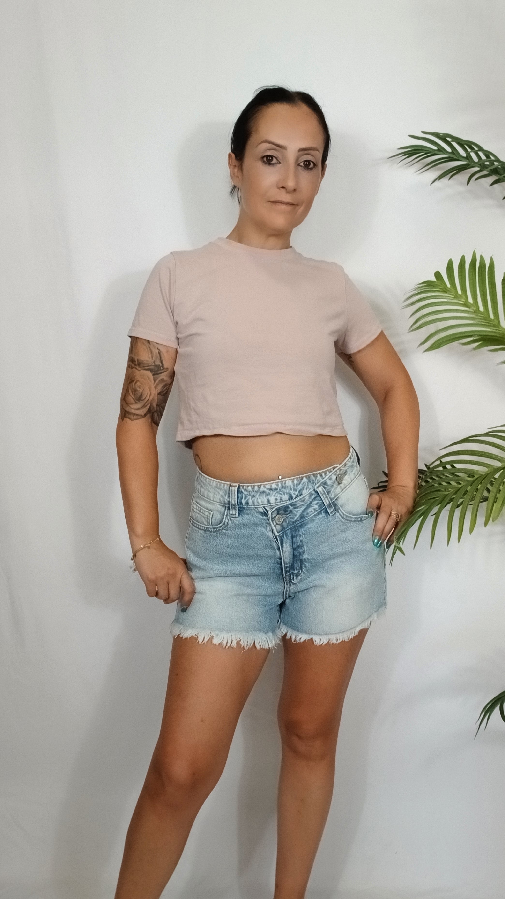 Jeans corto bottone laterale