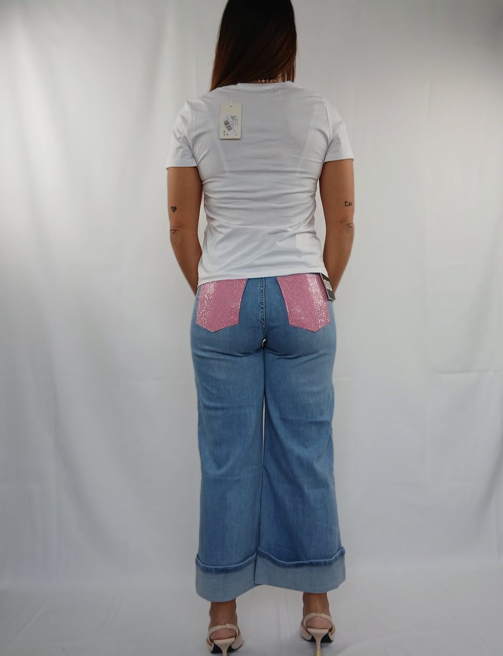 Pantalone palazzo con piega tasca rosa e brillantini