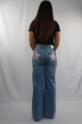 Pantalone palazzo jeans con tasche stella rosa e swarovskii