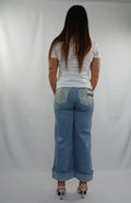 Pantalone jeans con piega e tasca brillantini