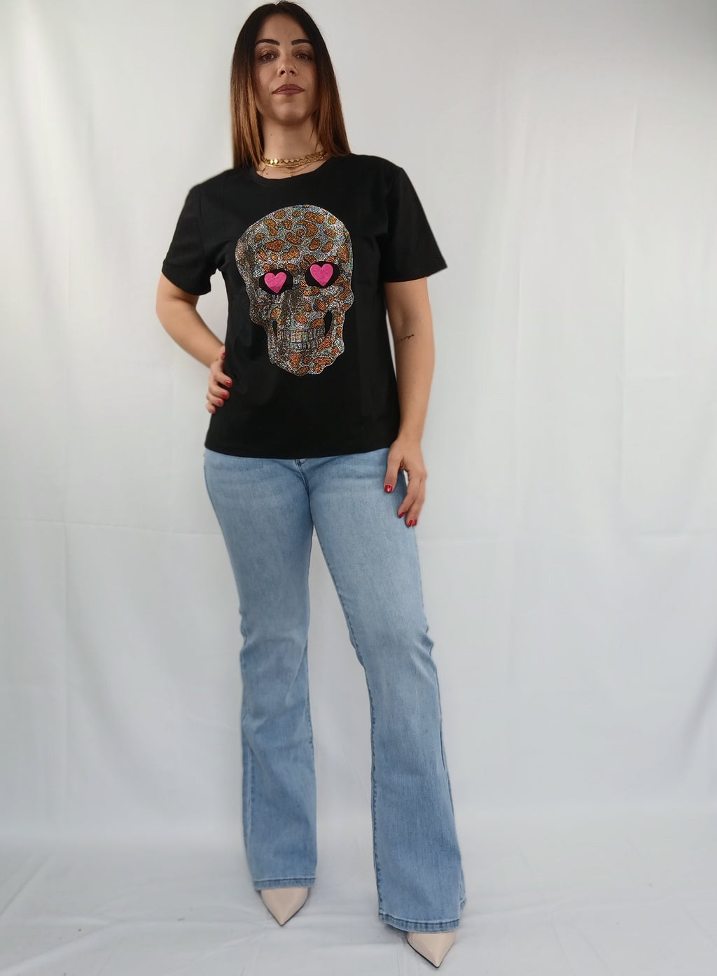Pantalone jeans zampa con tasche rosa e brillantini