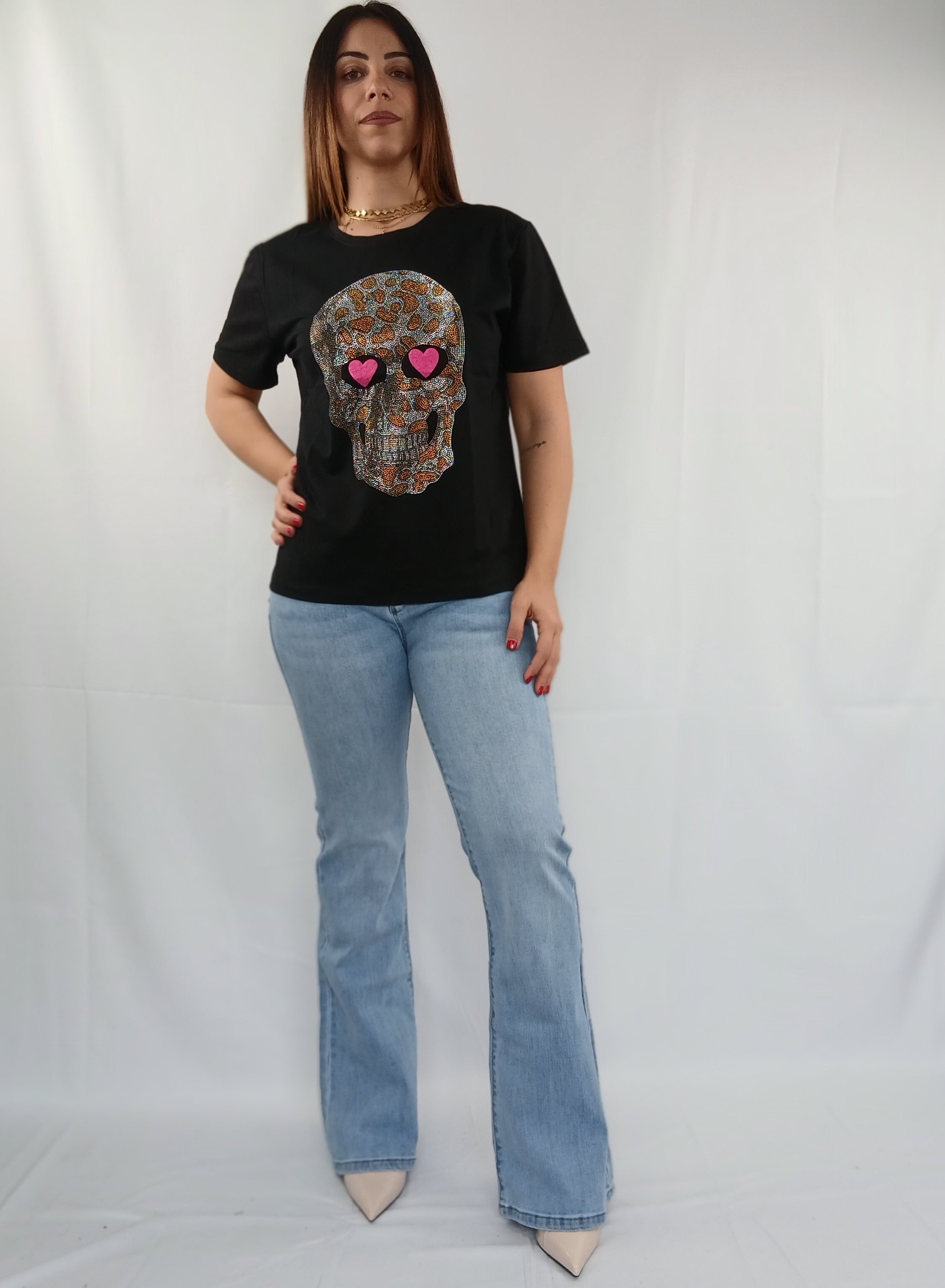 Pantalone jeans zampa con tasche rosa e brillantini